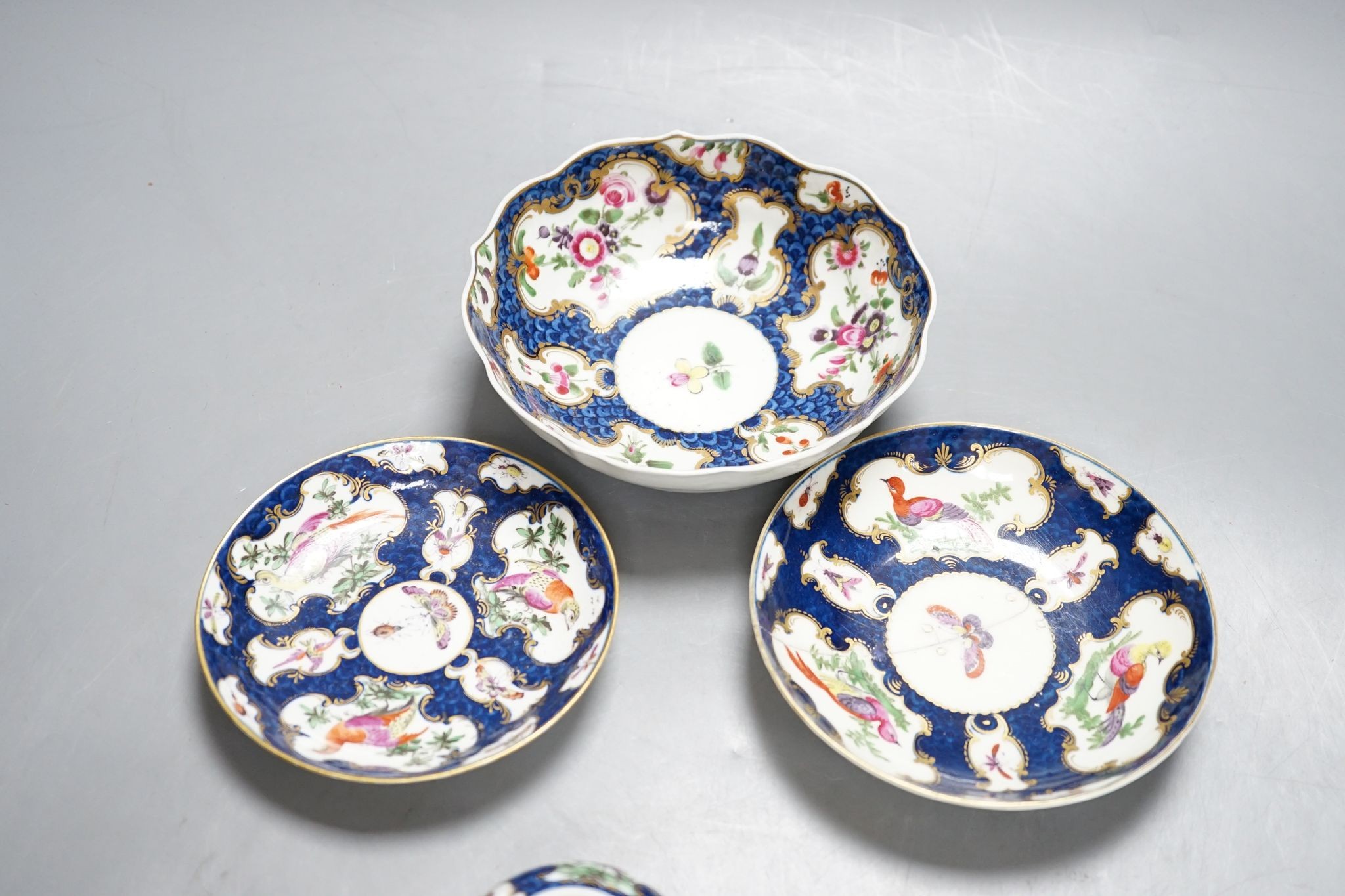 A Worcester scale blue chocolate cup and saucer and a pair of similar tea bowls and saucers, circa 1775